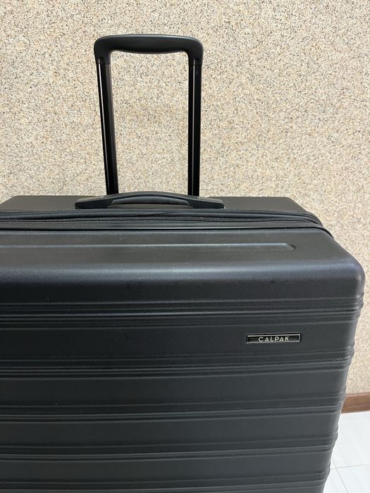 Голям куфар с 4 колелца