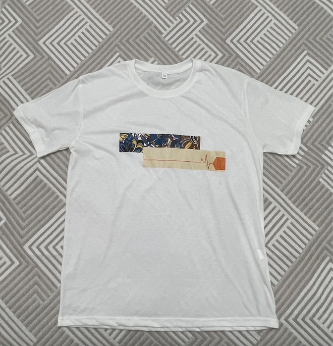 Футболки новые.