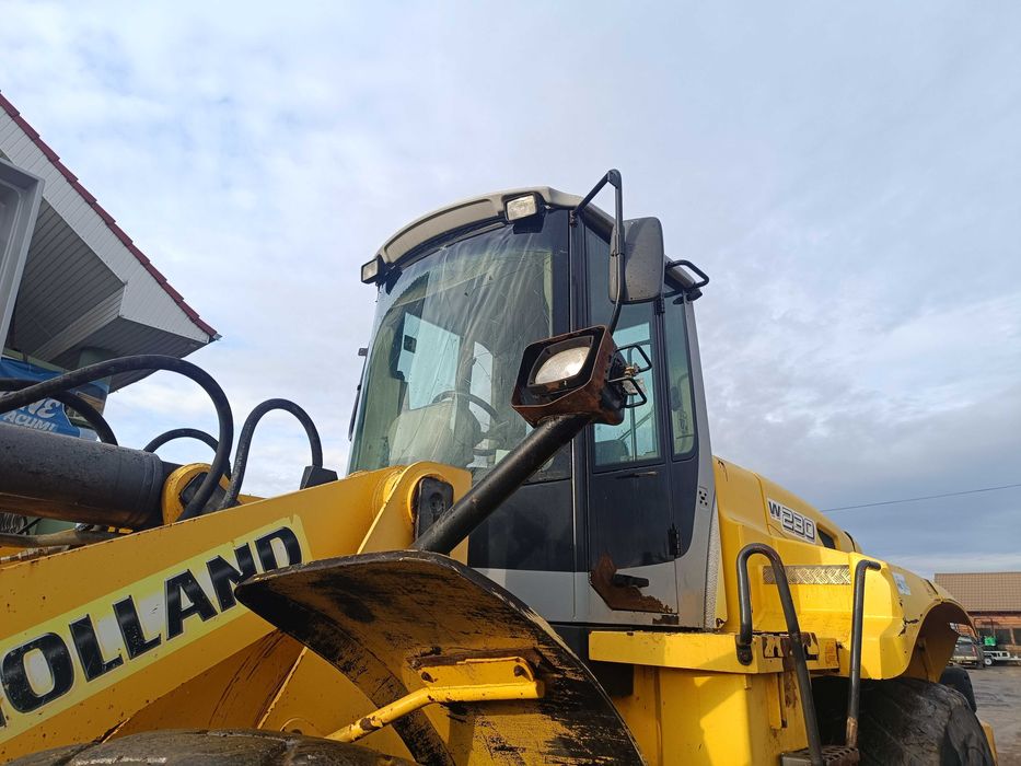 Încărcător frontal NEW HOLLAND W231, 22 tone, 2006