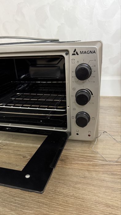 Продам Духовку Magna