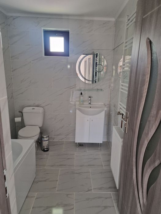 Casa noua la cheie, toate utilitățile, curte amenajata