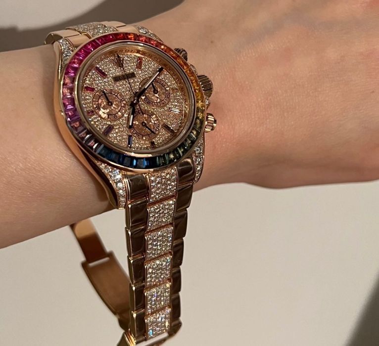 Rolex rainbow . Gold 20K, sapphires/diamonds. Luxury quality.