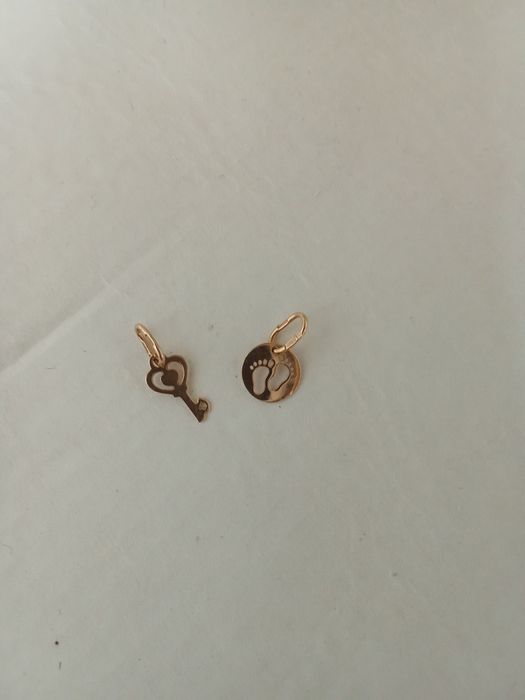 Продам кулон золото