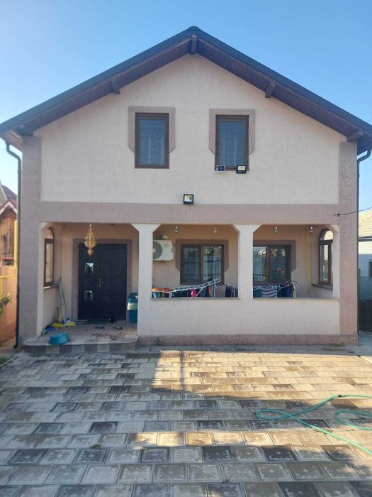 Vand casa parter 120 mp,teren 1000 mp + foisor si bucatarie vara 50 mp