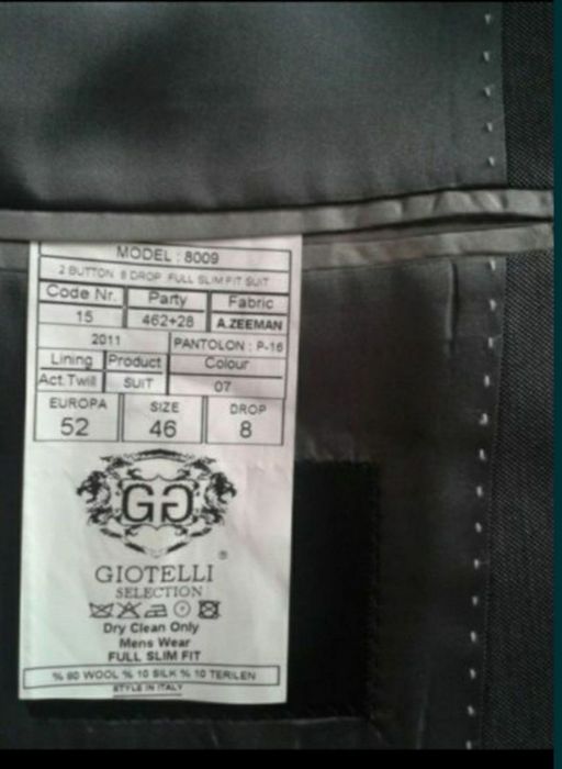 Новый костюм размер 52,