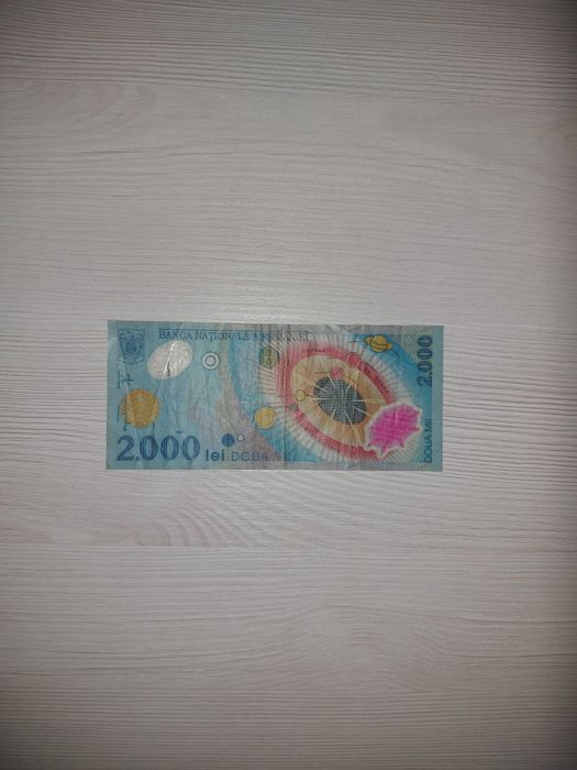 Bancnota 2000 de lei cu eclipsa din 1999
