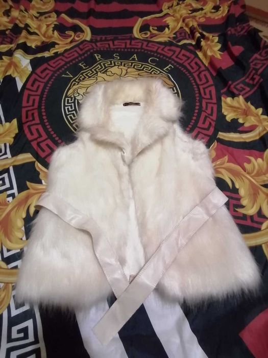 Дамски елеци и грейки