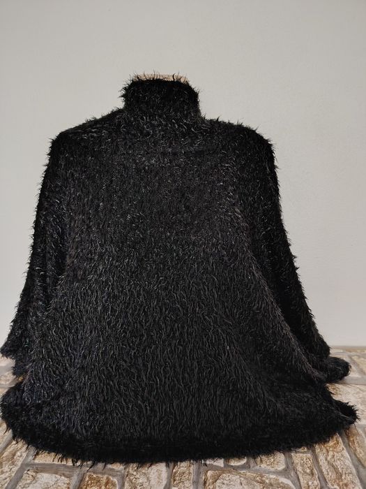 Poncho/capa deosebit