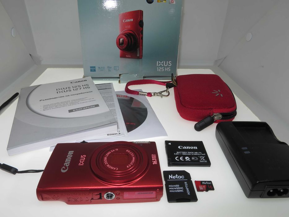 Canon IXUS 125 компактен цифров фотоапара в оранжево червен цвят уникат и отлично състояние като НОВ, работи перфектно