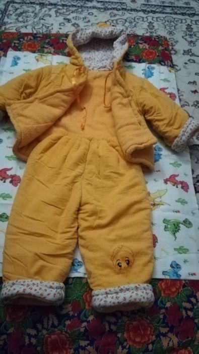 Продам зимний комбинезон 2000