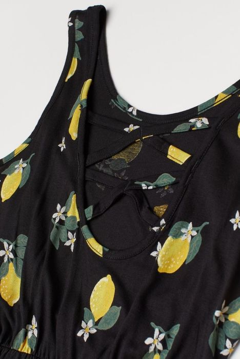 Черен платнен гащеризон на лимони