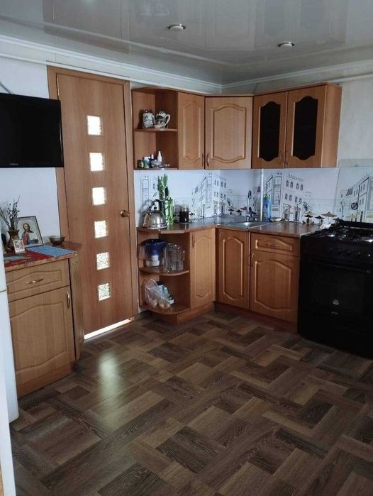 Дом в городе с ухоженным участком