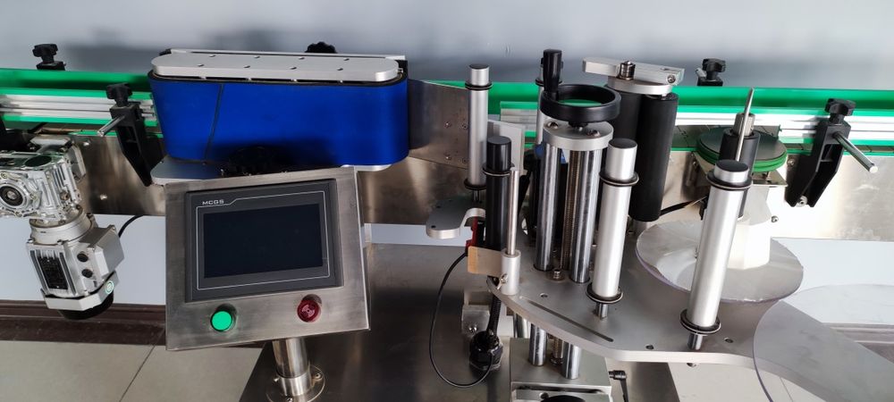 Этикетка Ускунаси - Etiketka yopishtiruvchi