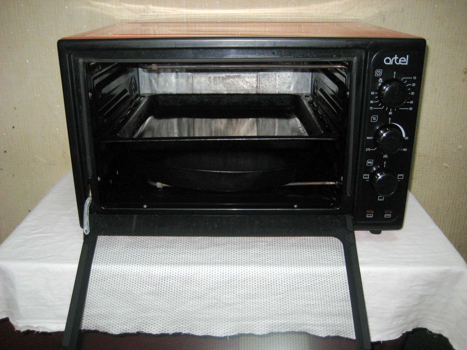 Печь духовка 40лт деярли янги куп ишламаган почти новая малоползвано!