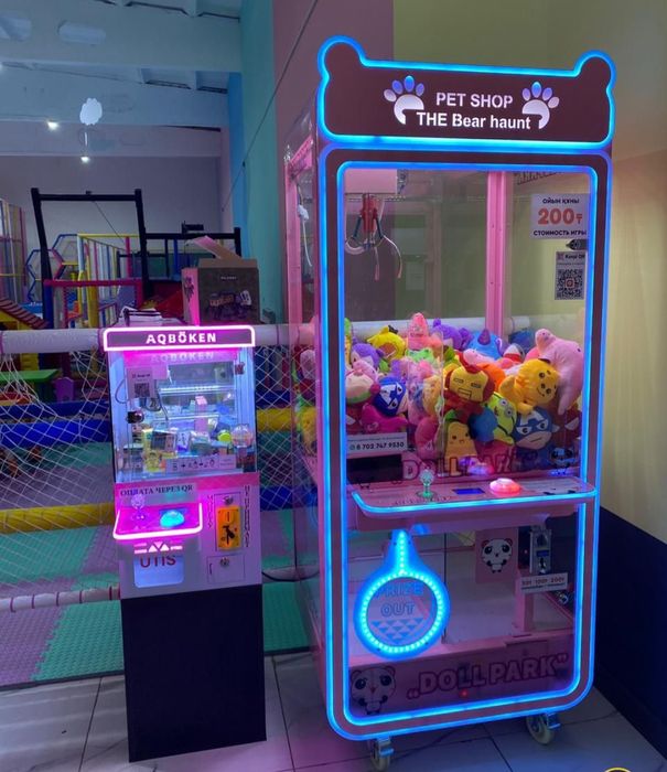 Игровой аппарат с игрушками