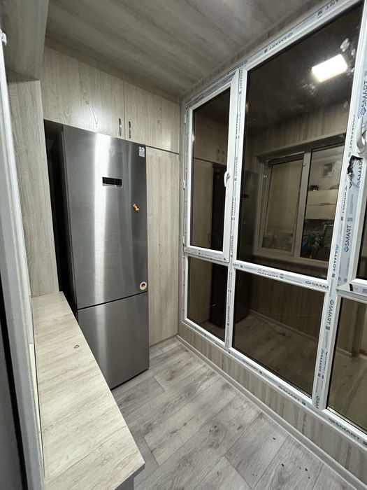 Ремонт балкона, утепление обшивка