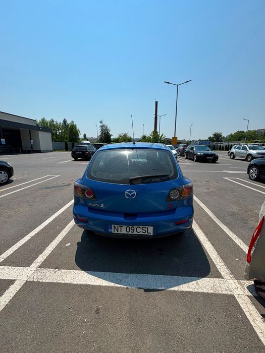 Vand mazda 3 1.4 benzina an 2006 masina merge fine traga bine nu are nimic propleme