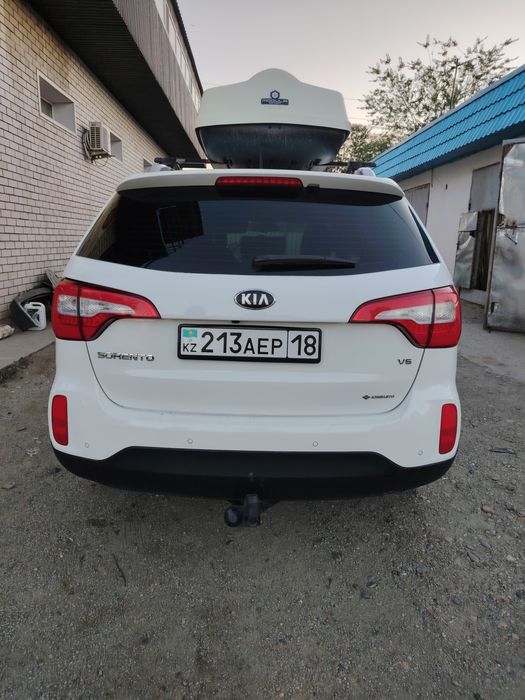 Kia sorento 2013 год