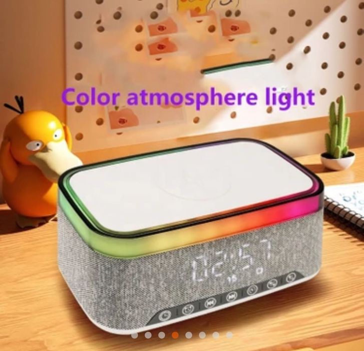 Безжична Bluetooth колонка с функция за зареждане на телефон отгоре, RGB дизайн, аларма и часовник.