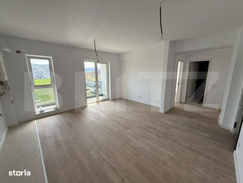 Apartament cu 2 camere, finisat, bloc nou, cu parcare subterana — fotografia 1