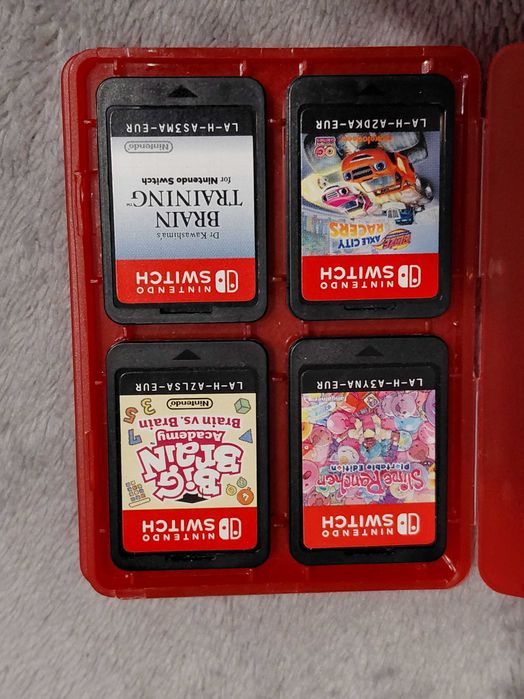 Vand Nintendo Switch Lite in stare foarte buna cu 8 jocuri, husa