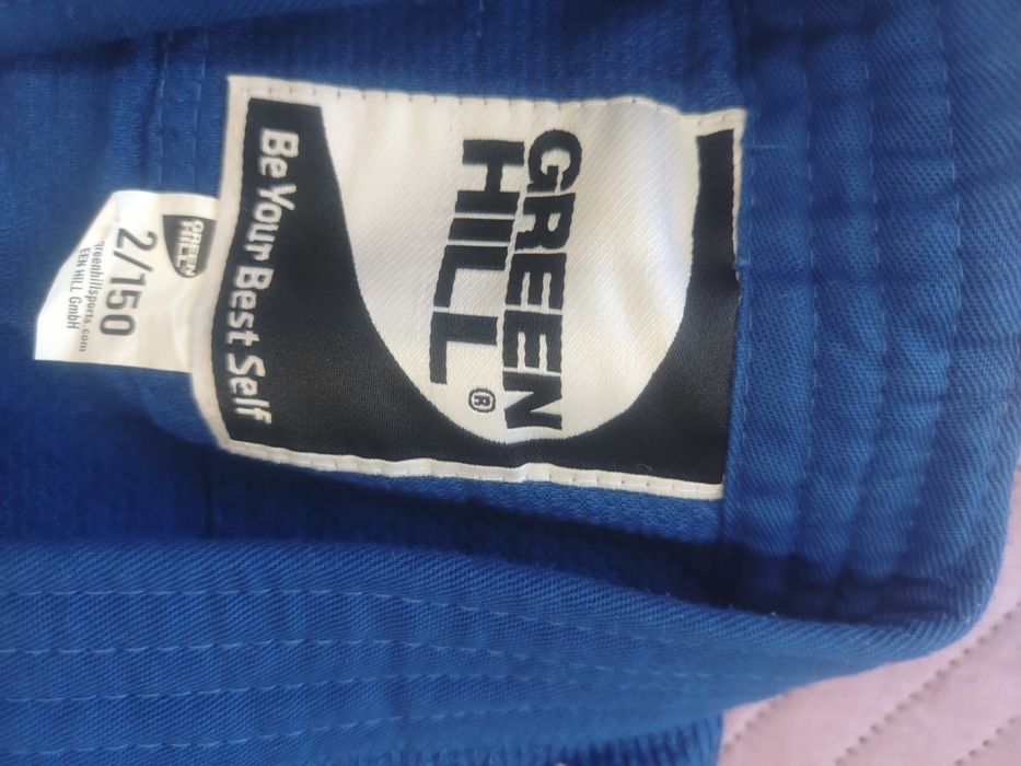 Продам кимоно для дзюдо новая