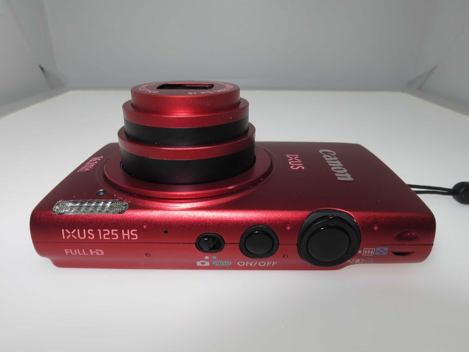Canon IXUS 125 компактен цифров фотоапара в оранжево червен цвят уникат и отлично състояние като НОВ, работи перфектно