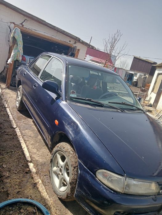 Митсубиси Лансер.