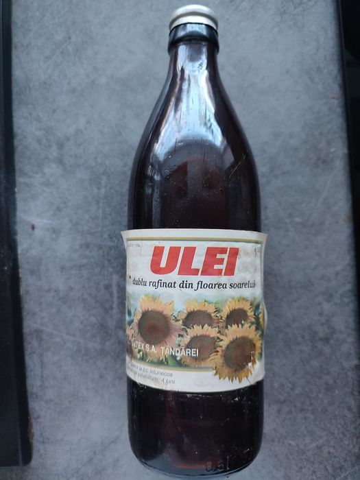 Vând sticla de ulei 1998
