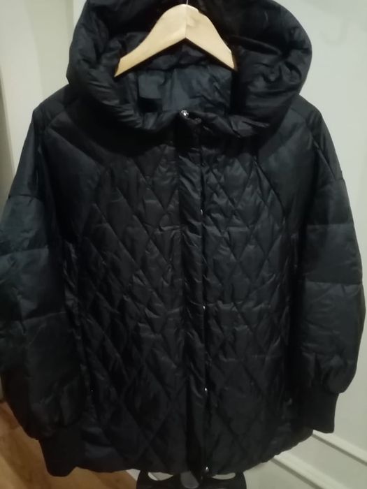 Новый пуховик, лебяжий пух.