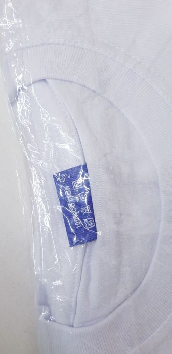 Белый футболка великан 50сум ХБ100%