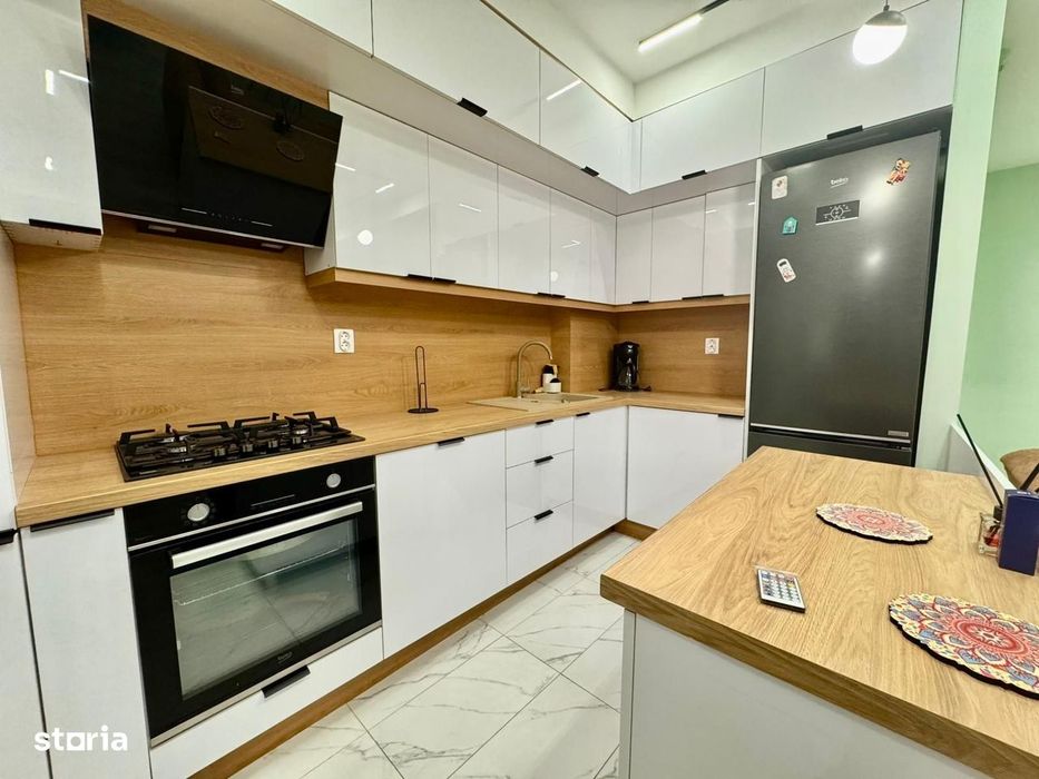 COSMOPOLIS - Apartament cu 3 camere si gradina, mobilat si utilat.