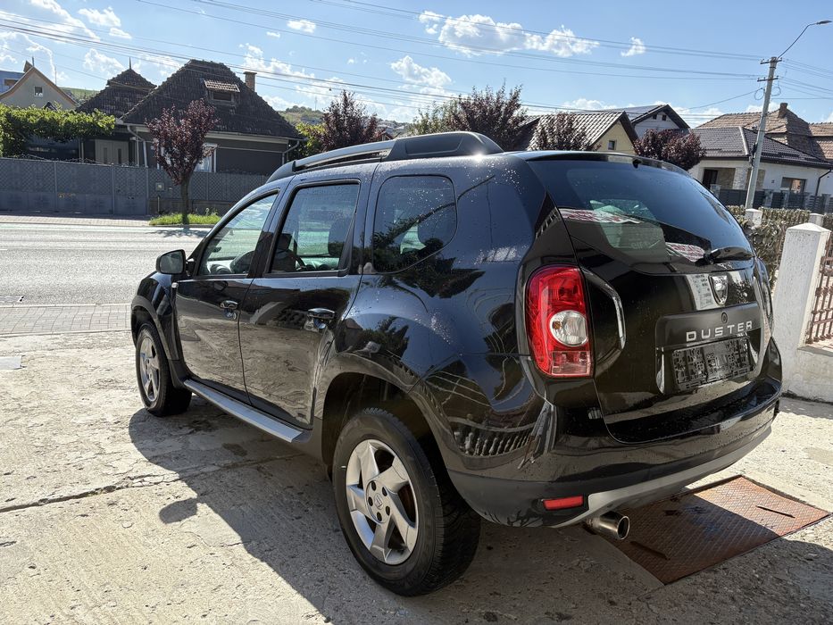 Dacia duster 1,6 benzina +Gpl de fabrica /An 2013/4x2/Aer conditionat /Tapiterie piele
