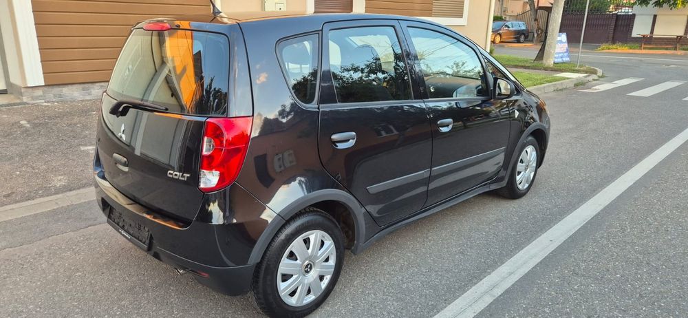 MITSUBISHI  COLT, fabricatie 2011, 1.3 benzina euro 5, 2300 euro.neg.
PRET 2450 EURO.NEG.