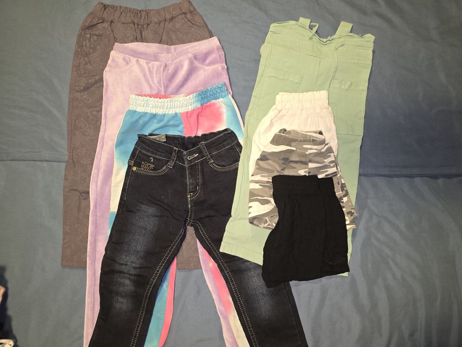 Отдам пакет вещей на девочку 110-128 за шоколадку