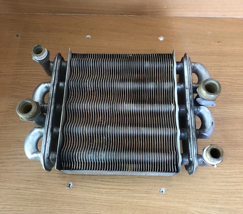 Продам теплообменник на Рига 18w