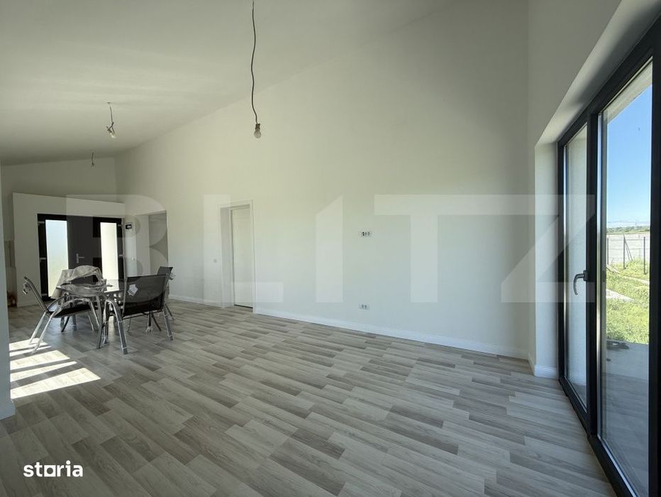 Casa pe parter cu un design deosebit, zona nordica / Simnicul de Jos