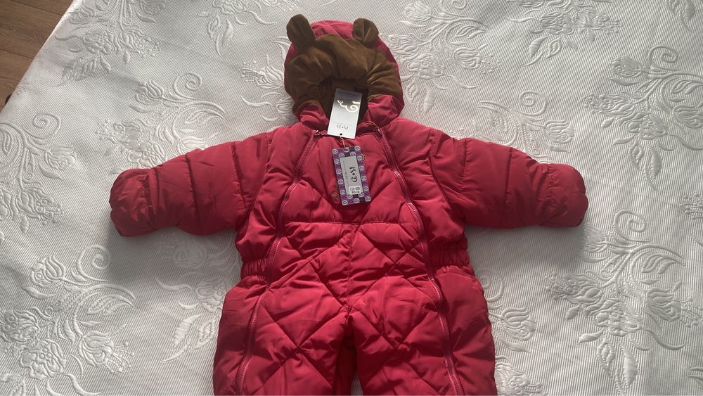 Продам детский комбинезон новый