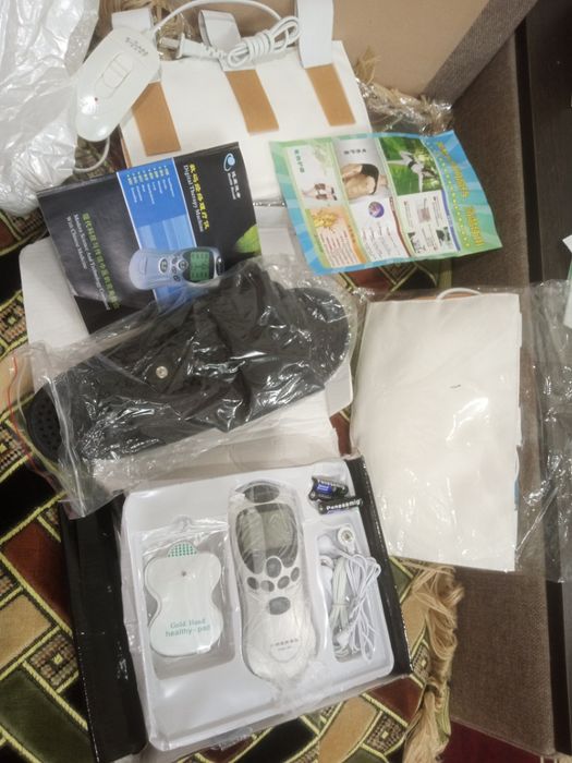 Массажёр для ног с электроподогревом.