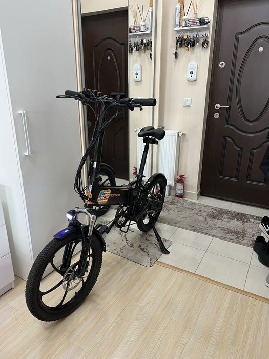 Bicicleta electrica pliabila ,  asistata ADO cu frane hidraulice