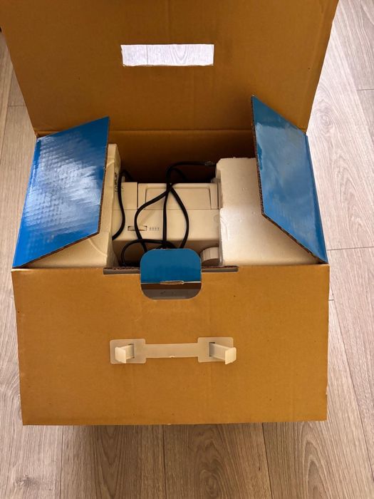 Masina cusut singer noua