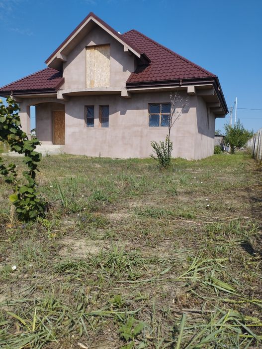 Casa la gri cu Teren Aferent