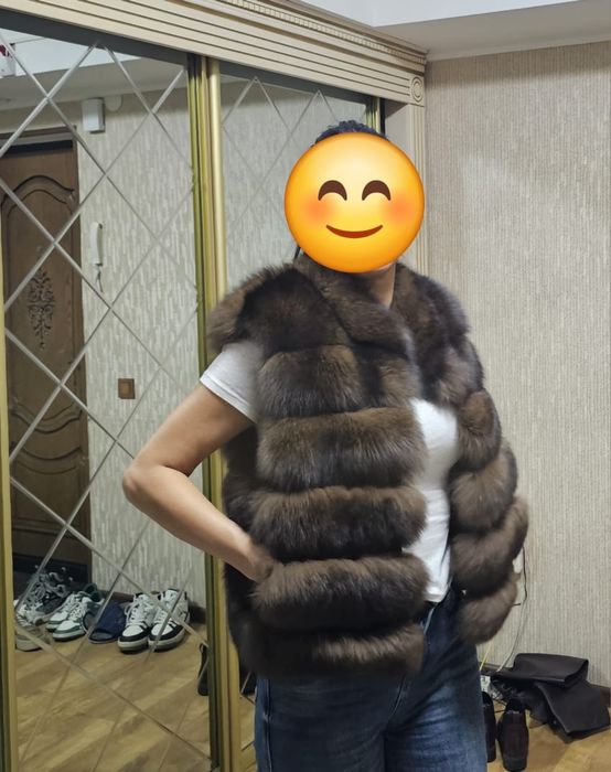 Продам жилетку новую