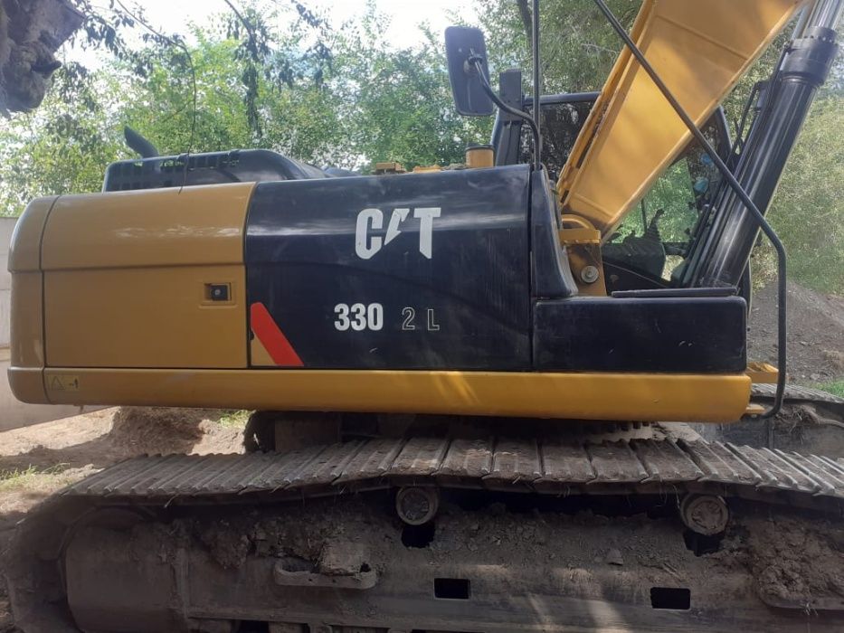 Экскаватор с гидромолотом. Гидромолот CAT B30