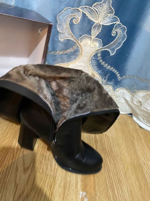 Кожаные сапоги .