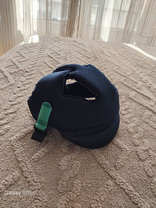 Бебешка каска за прохождане