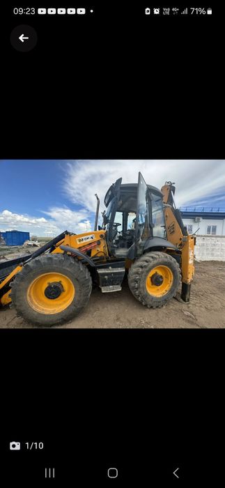 Экскаватор погрузчик гидромолот телескоп. Мини экскаватор.