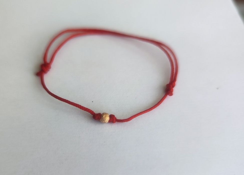 Brățară reglabila handmade cu o bila de argint placata cu aur roz de 14 k stardust pentru copii sau pentru adulți