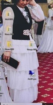 Нарядное белое платье