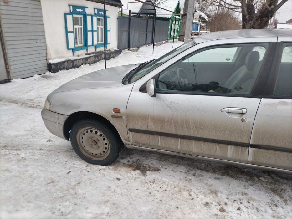 Ниссан примера р11 1999 год